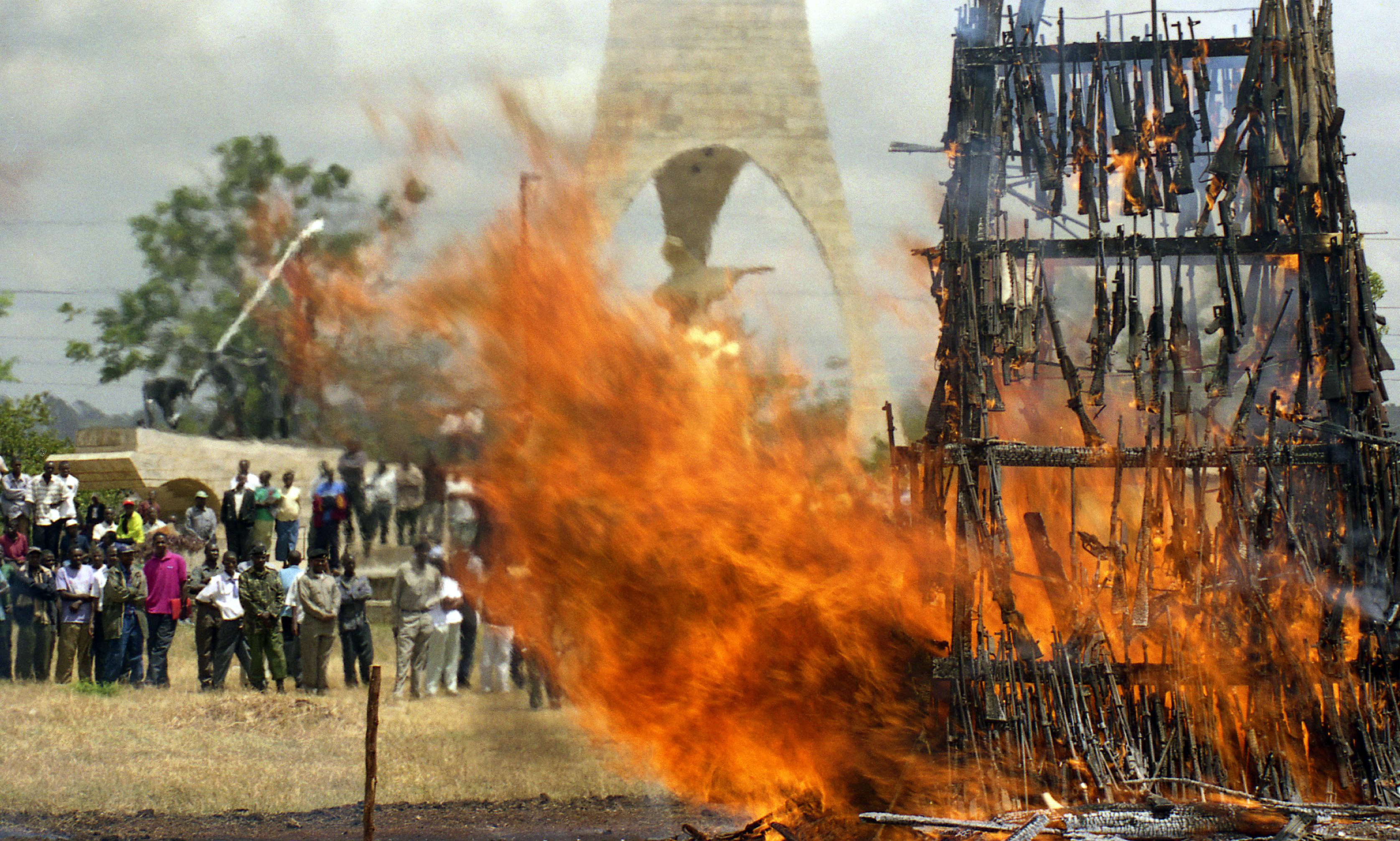 Illegal Fire arms are put on fire at Uhuru gardens , Nairobi Kenya.The Goverment confiticates illegal fire arms in an effort to fight banditry in it's borders.Photo Antony Kaminju