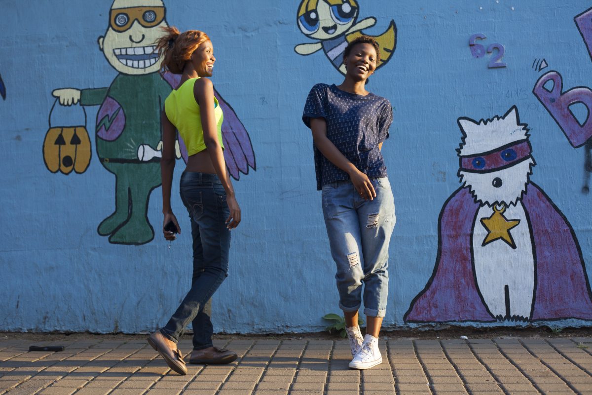 Sunday in Yeoville UNDAY BEST
For many immigrants who come to Johannesburg they battle to adapt to the challenges of a new life in a big city. Their cultural ways become a thing of memory than one to be lived. Many struggle to adapt to the ways of the big city. However one thing that is common to many immigrants is the specialness associated with Sundays. In many African communities Sunday is a special day, one of worship and relaxation. More to this is that it’s the day to look smart. It’s the day to wear your ‘Sunday best’ as it’s called. It’s the day to wear that jewellery that is special, or the suit, dress that arouses attention. Its perceived as family day, one to sit back and relax.
The approach to the project is street photography on selected streets of Yeoville. Yeoville is inhabited by a large number of African immigrants. The participants will be photographed on Sundays when going or coming from their places of worship or just those who may fit within the theme of ‘Sunday best.’
Yeovile Landscape
Yeoville is said to have been one of the best residential suburbs before 1994. The area was declared a suburb in 1890 and was advertised as a sanitarian for the rich. Set on a ridge, it was said its air was purer unlike the smoky mining city of Johannesburg below, which was fast developing at the time. Over the years, Yeoville has gone through a transformation from a mainly Jewish area to a bohemian cultural centre that attracted all kinds of burgeoning artists and activists. The main streets such as Rocky were transformed from a quiet area that catered for local residents to a host of restaurants, bars, art clubs that attracted visitors from afar.
By 1990’s most of the white residents were moving to seemingly better suburbs due to great infrastructure decay and chaos including drugs and other crimes that visited Yeoville. Their place was taken mainly by hundreds of African immigrants and the area is generally perceived to be a Pan Africanist suburb. Although